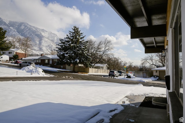 exterior space with a mountain view and a residential view