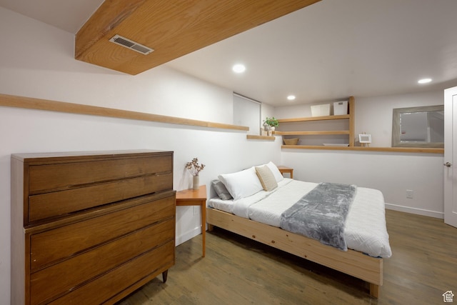 bedroom featuring recessed lighting, visible vents, and wood finished floors