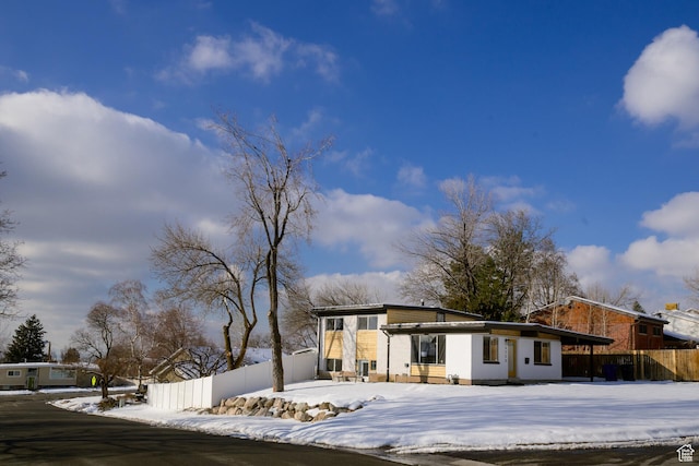 view of front of property with fence
