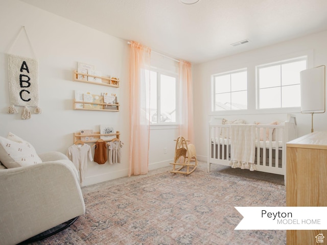 carpeted bedroom with visible vents