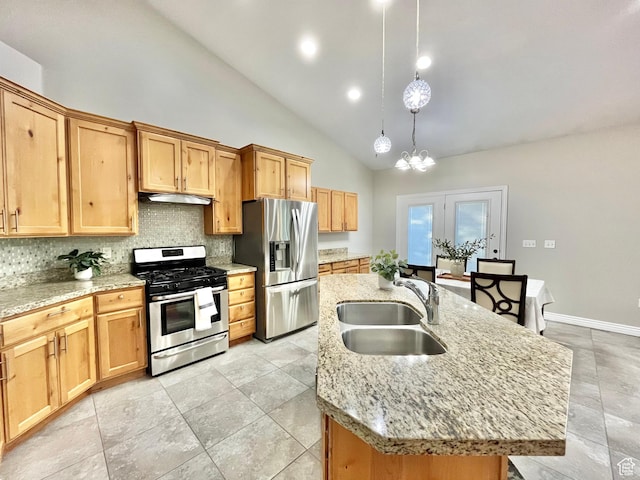 1184 W Michaelsen, West Jordan, UT 84088 - kitchen featuring stainless steel appliances, under cabinet range hood, tasteful backsplash, a kitchen island with sink, and high vaulted ceiling