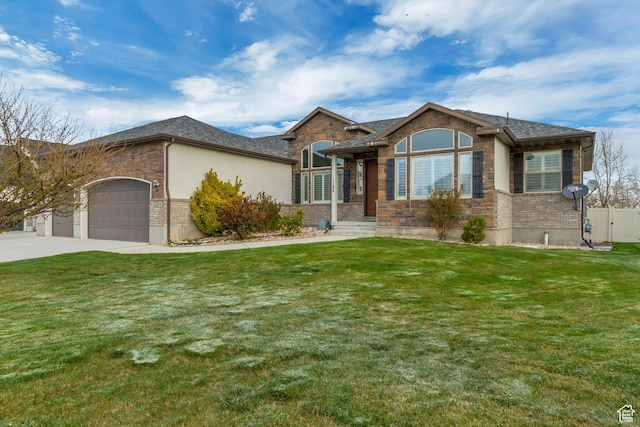 1184 W Michaelsen, West Jordan, UT 84088 - view of front of house with a garage, stone siding, and a front lawn