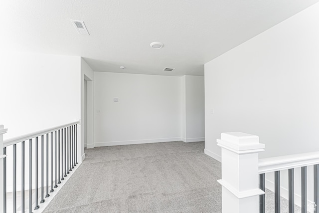 3759 W 950 N Unit 376, Lehi, UT 84043 - corridor with carpet floors, an upstairs landing, and a textured ceiling