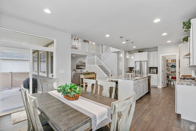 15097 S Cantle Dr, Bluffdale, UT 84065 - dining area featuring dark wood-type flooring and recessed lighting