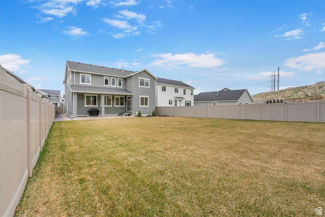 15097 S Cantle Dr, Bluffdale, UT 84065 - back of property with stucco siding, a patio area, and a shingled roof