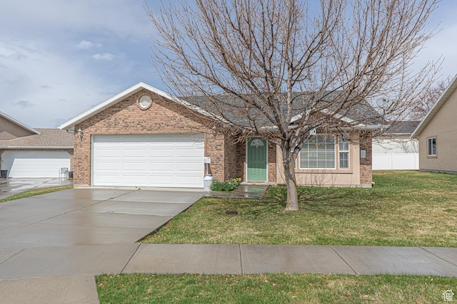 ranch-style house featuring driveway, a front yard, a garage, and brick siding