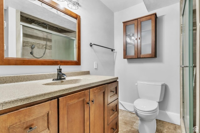 full bathroom with baseboards, an enclosed shower, toilet, and vanity