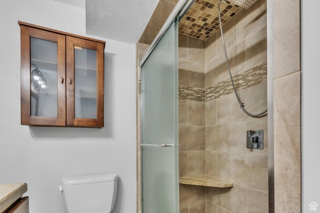 full bath featuring toilet and a shower stall