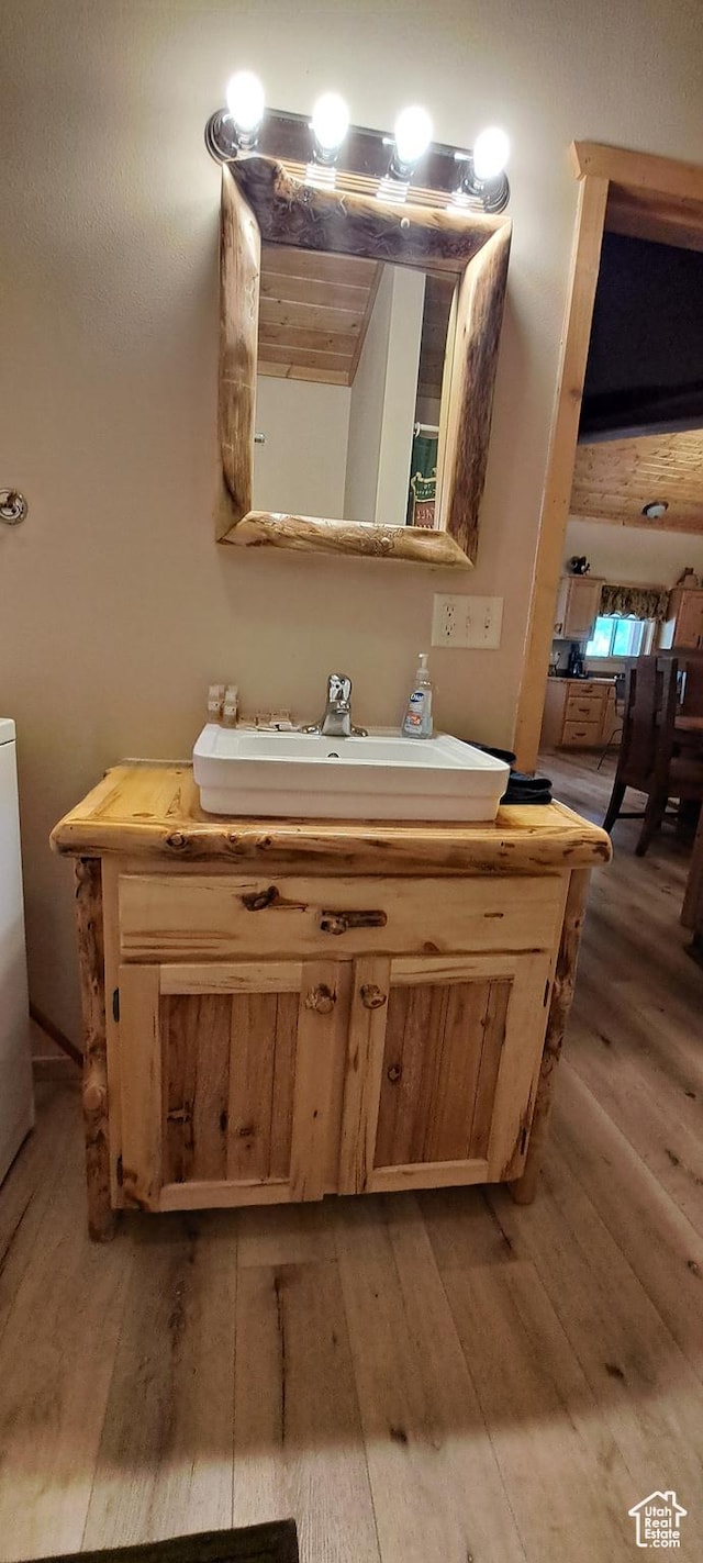 3526 Browning Rd, Island Park, ID 83429 - bathroom with hardwood / wood-style floors and vanity
