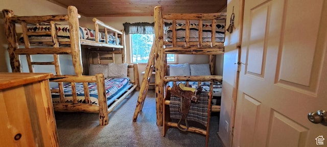 3526 Browning Rd, Island Park, ID 83429 - bedroom featuring wooden ceiling and carpet flooring