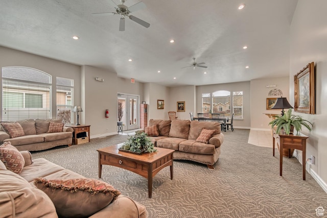 carpeted living room featuring a healthy amount of sunlight, baseboards, recessed lighting, and a ceiling fan