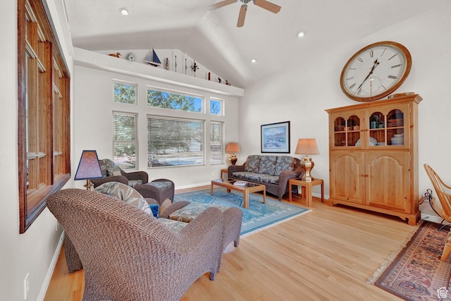 3674 N Willow Brooke Ln, Eden, UT 84310 - living room with baseboards, high vaulted ceiling, light wood-style flooring, and a ceiling fan