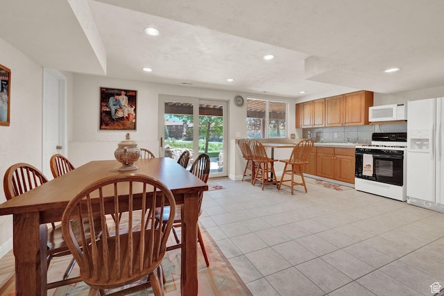 3674 N Willow Brooke Ln, Eden, UT 84310 - dining space featuring light tile patterned flooring, baseboards, and recessed lighting