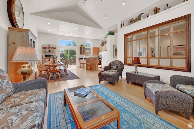 3674 N Willow Brooke Ln, Eden, UT 84310 - living area with high vaulted ceiling, wood finished floors, and recessed lighting