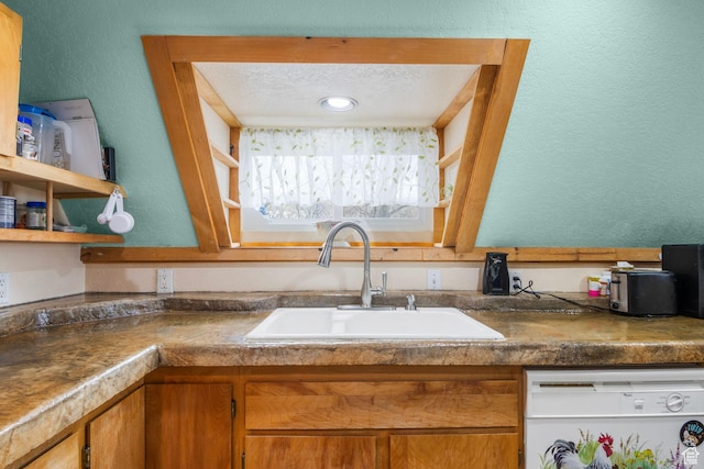 2586 S Red Willow Ln Unit 607, Heber City, UT 84032 - kitchen featuring a sink, dishwasher, a textured ceiling, dark countertops, and a textured wall