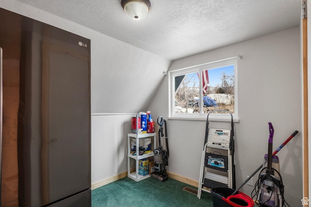 2586 S Red Willow Ln Unit 607, Heber City, UT 84032 - recreation room with baseboards, vaulted ceiling, carpet floors, and a textured ceiling