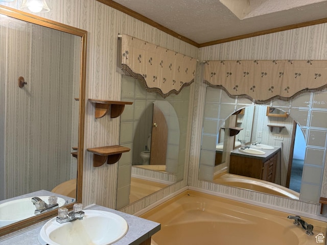 2445 N 260 W, Elmo, UT 84521 - full bathroom with wallpapered walls, toilet, and a textured ceiling