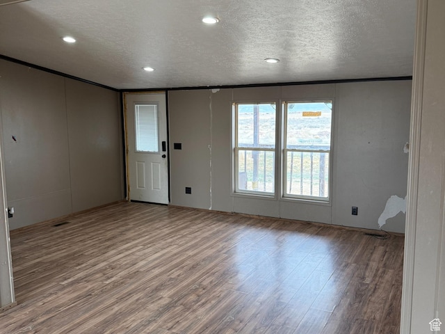 2445 N 260 W, Elmo, UT 84521 - interior space with recessed lighting, a textured ceiling, and wood finished floors