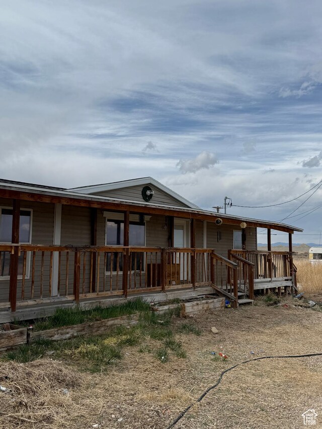 2445 N 260 W, Elmo, UT 84521 - view of front of property featuring covered porch
