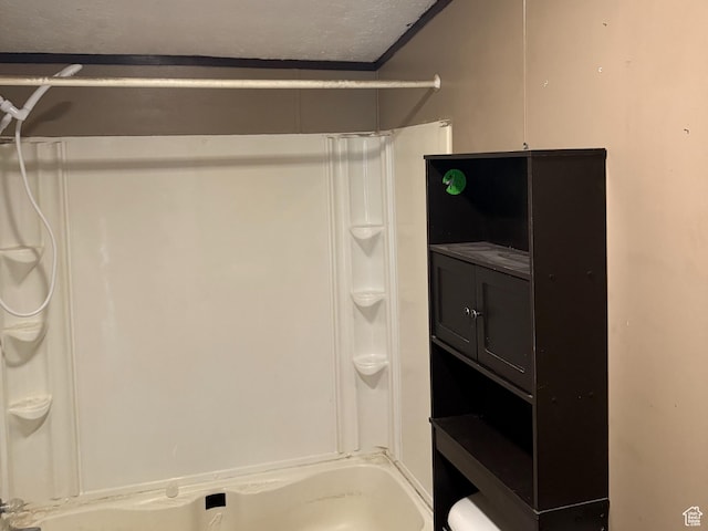 2445 N 260 W, Elmo, UT 84521 - full bathroom with  shower combination and a textured ceiling