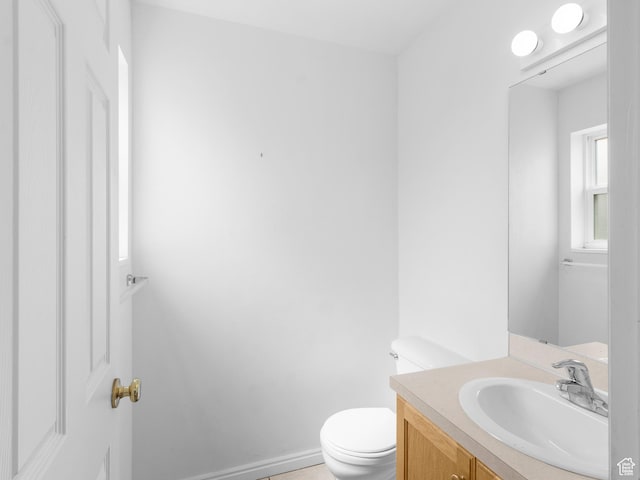 476 W 365 S, Logan, UT 84321 - half bath featuring baseboards, toilet, and vanity