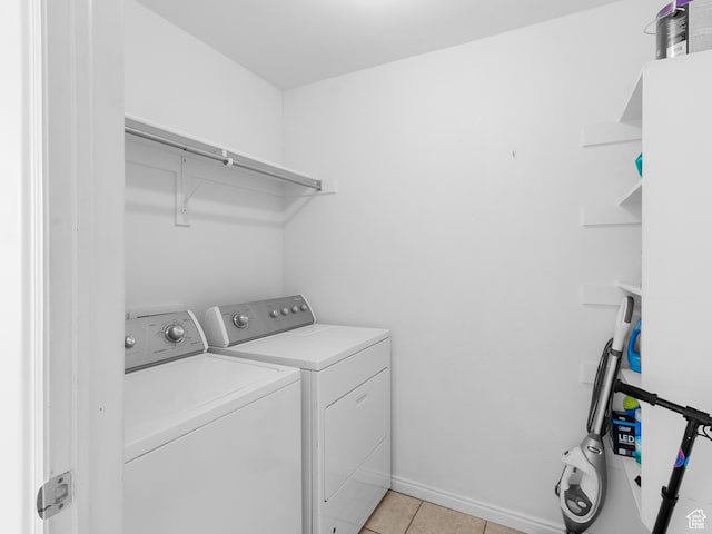 476 W 365 S, Logan, UT 84321 - clothes washing area with independent washer and dryer, light tile patterned floors, baseboards, and laundry area