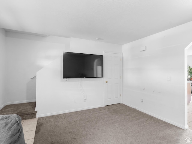 476 W 365 S, Logan, UT 84321 - unfurnished living room with baseboards and carpet floors
