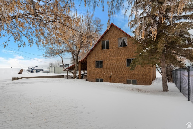 377 E Shore Rd, Saint Charles, ID 83272 - exterior space with fence and brick siding
