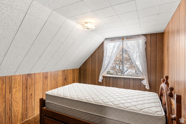 377 E Shore Rd, Saint Charles, ID 83272 - bedroom with lofted ceiling and wood walls
