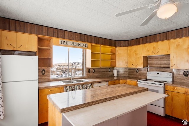 377 E Shore Rd, Saint Charles, ID 83272 - kitchen featuring a center island, white appliances, a sink, and open shelves