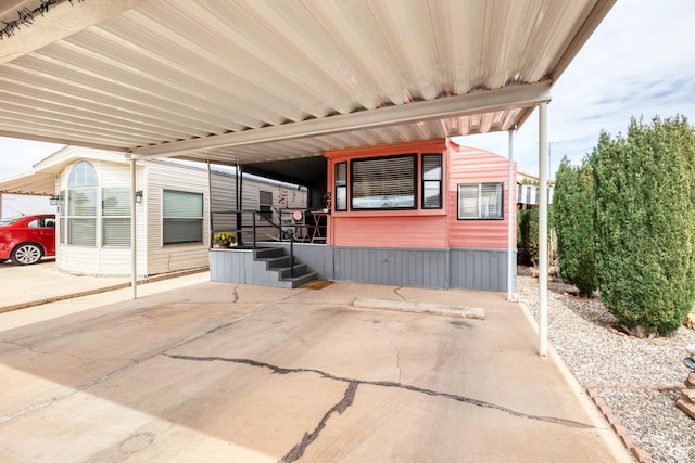 view of patio featuring an attached carport