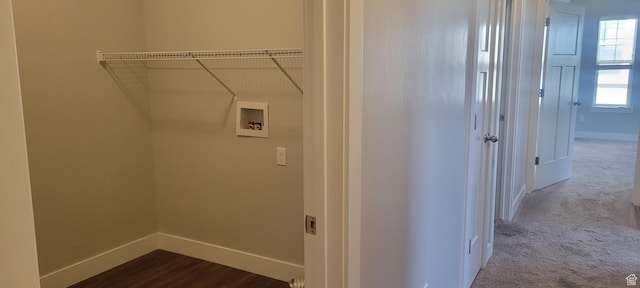 13091 S Newbridge Ln Unit F202, Herriman, UT 84096 - washroom featuring baseboards, dark carpet, laundry area, and hookup for a washing machine