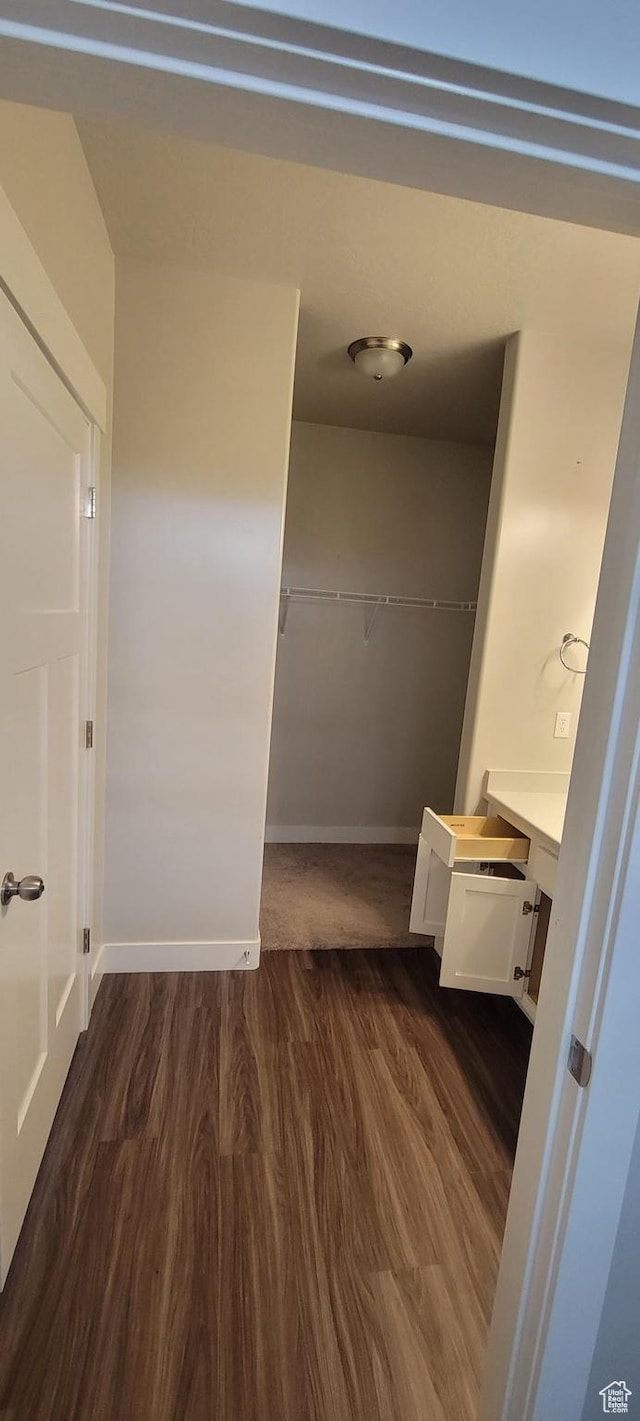 13091 S Newbridge Ln Unit F202, Herriman, UT 84096 - interior space featuring vanity, baseboards, and wood finished floors