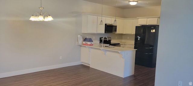 13091 S Newbridge Ln Unit F202, Herriman, UT 84096 - kitchen featuring white cabinets, light countertops, a peninsula, stainless steel appliances, and dark wood-type flooring