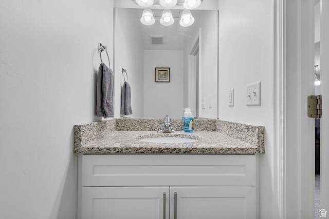 3414 S Melanie Cv W Unit 13, Magna, UT 84044 - bathroom with vanity and visible vents