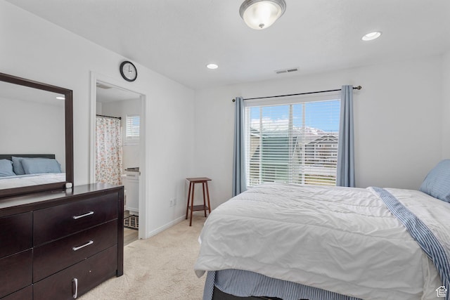 3414 S Melanie Cv W Unit 13, Magna, UT 84044 - bedroom featuring recessed lighting, light carpet, baseboards, and visible vents