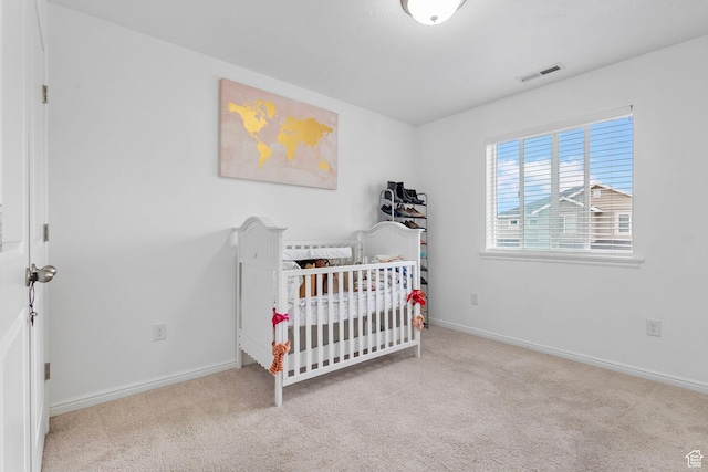 3414 S Melanie Cv W Unit 13, Magna, UT 84044 - bedroom featuring baseboards, visible vents, and carpet floors