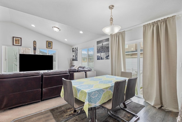3414 S Melanie Cv W Unit 13, Magna, UT 84044 - dining area with vaulted ceiling, wood finished floors, and recessed lighting
