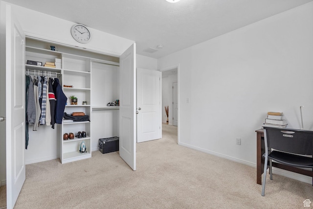 3414 S Melanie Cv W Unit 13, Magna, UT 84044 - bedroom featuring baseboards, a closet, and carpet