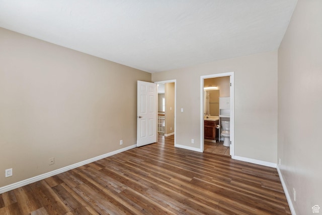 499 N 200 W Unit 8, Bountiful, UT 84010 - unfurnished bedroom featuring ensuite bathroom, baseboards, and wood finished floors