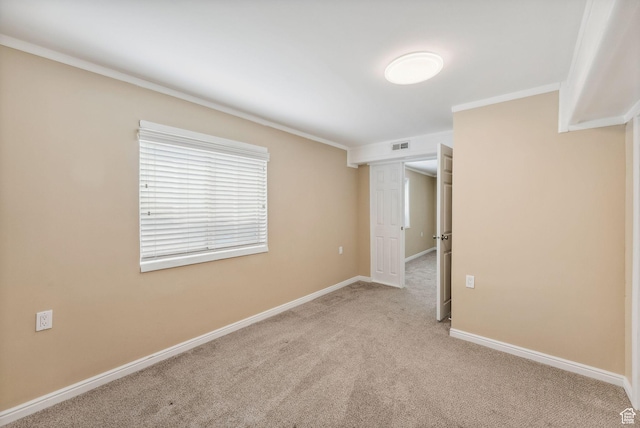 499 N 200 W Unit 8, Bountiful, UT 84010 - unfurnished bedroom with baseboards, ornamental molding, visible vents, and carpet