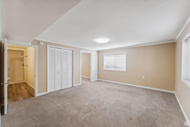 499 N 200 W Unit 8, Bountiful, UT 84010 - unfurnished bedroom featuring baseboards, carpet flooring, ensuite bathroom, and crown molding