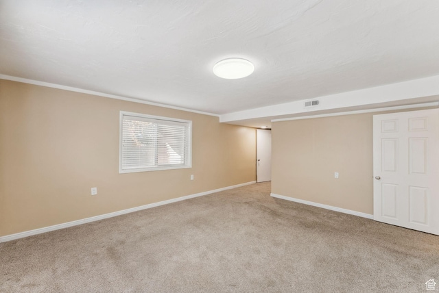 499 N 200 W Unit 8, Bountiful, UT 84010 - below grade area featuring crown molding, carpet, baseboards, and visible vents