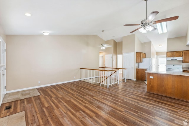 499 N 200 W Unit 8, Bountiful, UT 84010 - interior space with dark wood-style flooring, high vaulted ceiling, visible vents, baseboards, and a ceiling fan