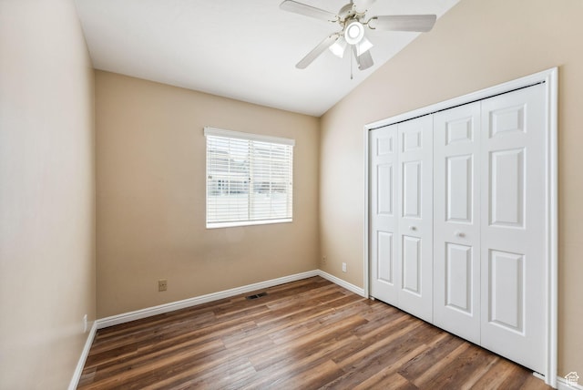 499 N 200 W Unit 8, Bountiful, UT 84010 - unfurnished bedroom with vaulted ceiling, a closet, wood finished floors, baseboards, and visible vents