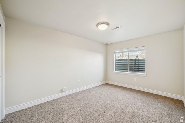 664 E Oak Wood Dr N Unit 50, Heber City, UT 84032 - carpeted empty room featuring visible vents and baseboards