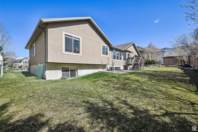 664 E Oak Wood Dr N Unit 50, Heber City, UT 84032 - back of house featuring a yard and fence