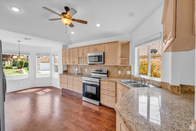 356 N Cactus Ln Unit 7, Washington, UT 84780 - kitchen featuring light brown cabinets, decorative backsplash, a sink, and stainless steel appliances