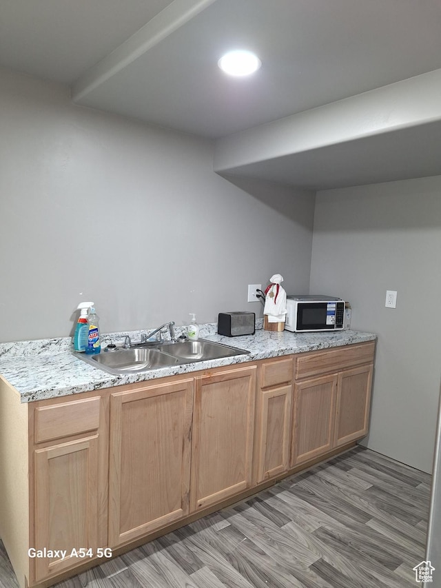 546 S Quirk St, Grantsville, UT 84029 - kitchen featuring light wood-style flooring and a sink