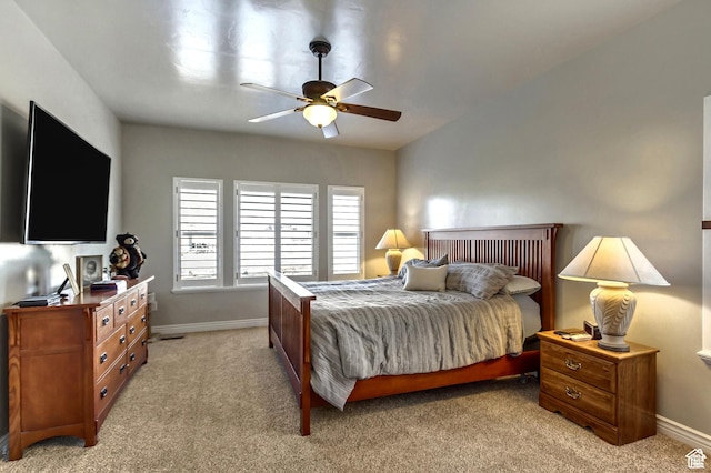 546 S Quirk St, Grantsville, UT 84029 - bedroom with baseboards, ceiling fan, and light carpet